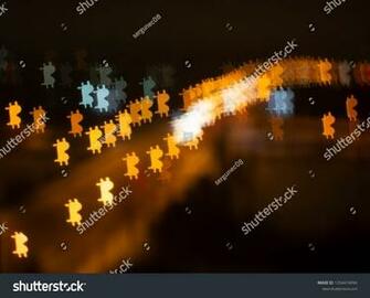Background Of Bitcoin Symbols On A Dark Cryptocurrency