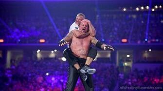 Shane Mcmahon Holding Undertaker From Neck Awl1129