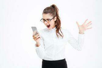 Annoyed Hysterical Young Business Woman In Glasses Talking On Cell