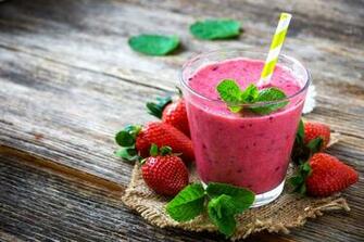 Summer Strawberry Smoothie On Rustic Wooden Background Profi