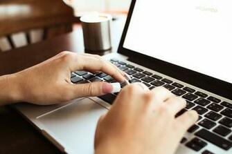 Girl Typing On Macbook Wallpaper