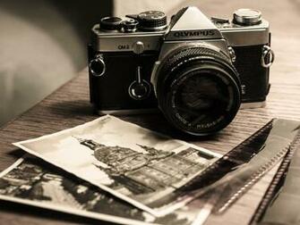Vintage Olympus Om Camera And Photographs Widescreen Wallpaper