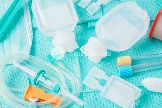 Disposable Infusion Set On Green Background Royalty Stock
