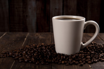 Coffee Mug Surrounded With Beans Desktop Wallpaper