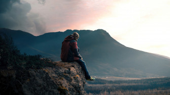 Boy Sitting Alone On High Mountain Rock 5k 1440p Resolution Wallpaper