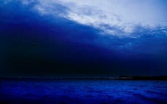 Sea Ocean Coast Shore Night Lights Sky Clouds Wallpaper Background