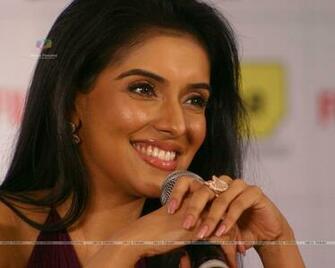 Bollywood Actress Asin At A Press Meet For The 55th Idea Filmfare