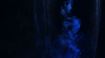 Abstract Dark Blue Background Ink In Water Close Up