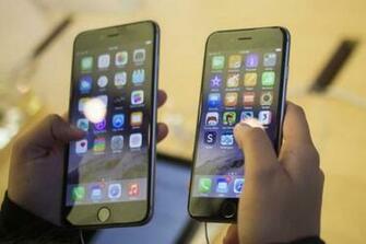Reuters Adrees Latif A Customer Holds An iPhone R And