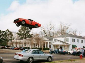 The Dukes Of Hazzard Movie Jump Police Cars Wallpaper
