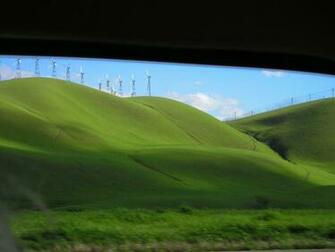 Green Hills Behind Broken Window Wallpaper Wide HD