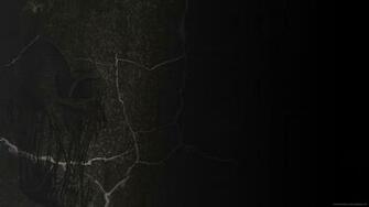 Skull On Black Stone Wallpaper