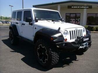 White Jeep Wrangler Unlimited Lifted Sahara