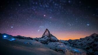 HD Mountains Night Sky Blurred Stars Light Show Wallpaper