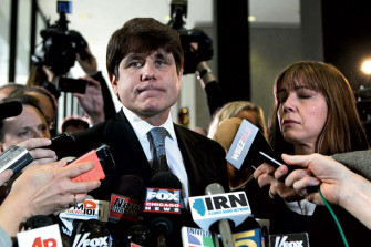 Rod Blagojevich Surrounded By Ers Wallpaper