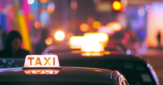 Blurred Background Of Passenger Entering Inside Taxi Cab