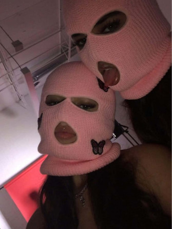 A Teenage Girl Enjoying Winter Day In Ski Mask Wallpaper