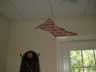 Exposed Brick Basement With Bar