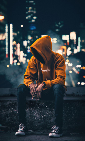 Hoodie Anonymus Boy Sitting Aside 4k iPhone HD Wallpaper Image