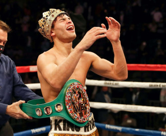 A Boxer Is Holding His Belt And Celebrating Wallpaper