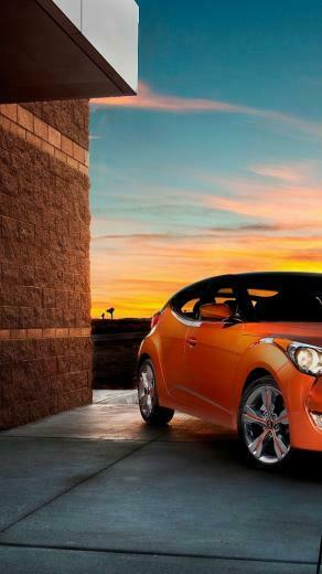 Orange Hyundai Veloster At Sunset iPhone Wallpaper