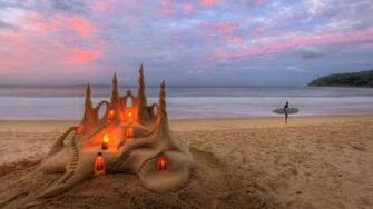Candles In Sand Castle Wallpaper
