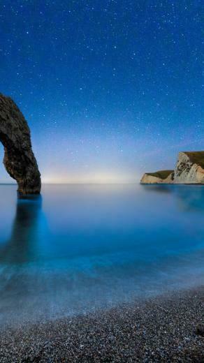 Wallpaper Durdle Door 5k 4k Beach Night Stars Sea