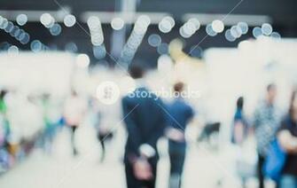 Blur Background Businessman Walking At Corridor In Convention Hall