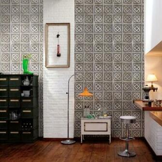 Featuring A Raised Clover Flower On Square Stone And Grey Tiles