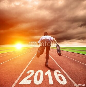 Happy New Year Young Man Running With Sunrise Background Stock