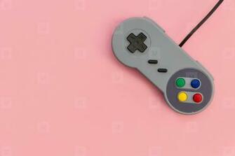 Photos Retro Video Game Controller Pink Background Youworkforthem