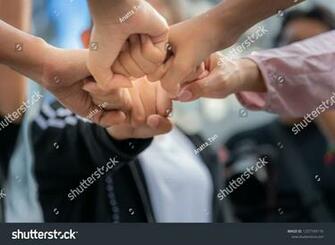 People Are Fist Bump To Express Teamwork Collaboration