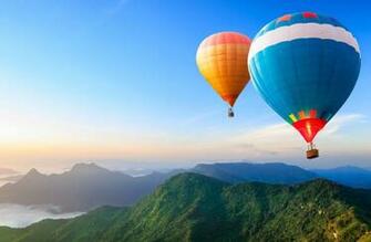 Hot Air Balloons Flying Over The Mountain 4k Ultra HD Wallpaper