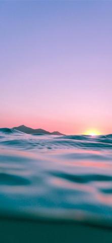 Calm Body Of Water During Golden Hour Wallpaper iPhone