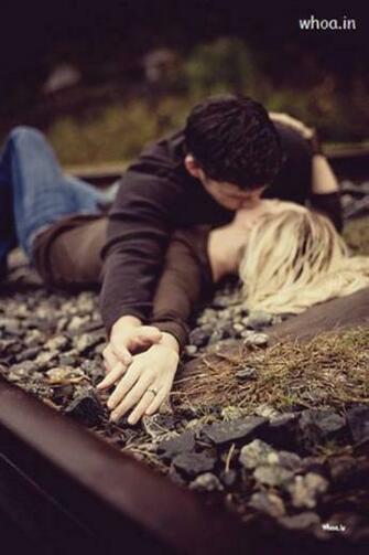 0couple Kiss Railway Track Wallpaper For Mobile Jpg