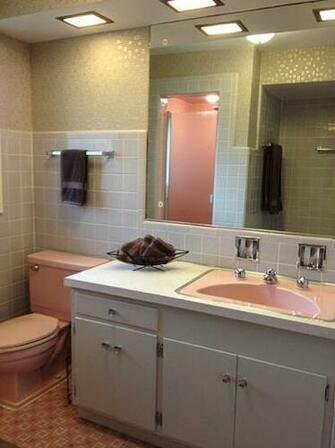 Bradbury Atomic Age Wallpaper Makes These Two 1950s Pink Bathrooms