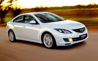 Mazda White Sedan Front Side Angle Moving Wallpaper