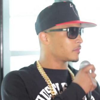 Ti S Wearing A Black Amp White Hustle Gang Sweatshirt