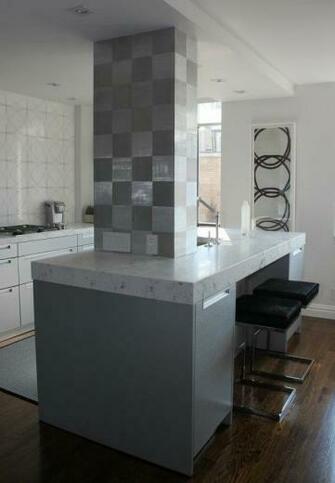 Kitchen Column Dressed With Donghia Stainless Steel Wallpaper Tiles