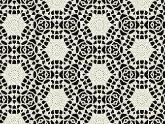 Image Of Lace Cream Wool Over Black Fabric Background