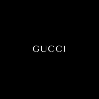 Gucci Logo On Black Wallpaper For Apple iPad Mini