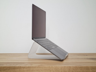 Black And Silver Laptop Computer On Brown Wooden Table Photo
