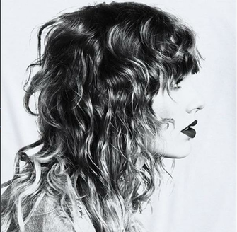 Taylor Swift Is Giving Us 70s Permed Realness In These