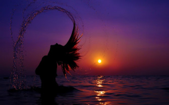 Girl Silhouette Against The Sunset Wallpaper