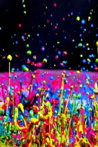 Rainbow Color Splash Paint Over A Neon