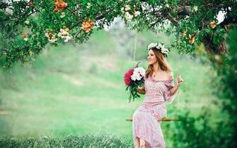 Beautiful Girl Sitting On The Swing Status For Womens Day