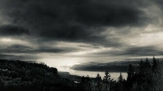 Dark Clouds Over The River Wallpaper