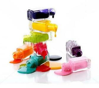 Bottles With Spilled Nail Polish Over White Background Jpg
