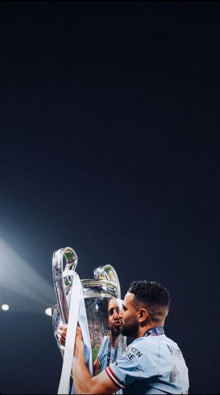 Wollpaper Of Riyad Mahrez With The Champions League Wallpaper