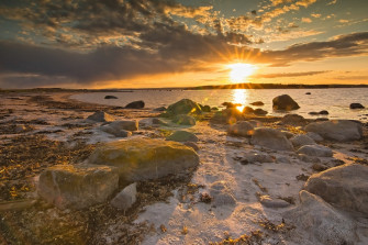 Gray Rocks On Sea Shore During Sunset Photo Nature Image